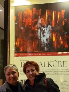 Janice and Anne in front of Die Walkure poster in NYC